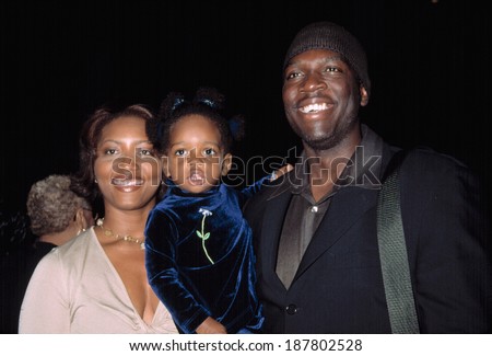 Rick Famuyiwa, director, and family at premiere orf BROWN SUGAR, NY 10/7/2002