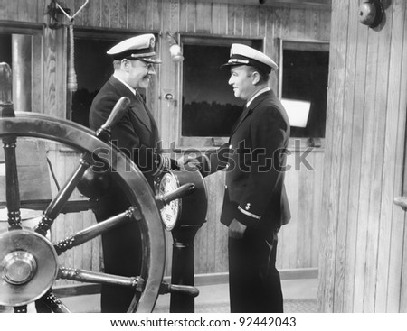 Two Captains Shaking Hands On A Boat Stock Photo 92442043 : Shutterstock