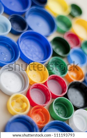 Colorful plastic bottle caps.