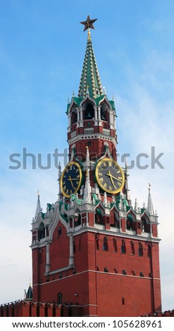 Moscow Kremlin. Spasskaya tower with a red star on a top of it and with a clock. Red Square, Moscow, Russia. UNESCO World Heritage Site.