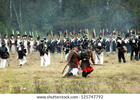 MOSCOW REGION, RUSSIA - SEPTEMBER 04: Unknown wounded soldiers at Borodino historical reenactment battle between Russian and French armies on September 04, 2011 in Borodino, Moscow Region, Russia.