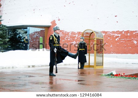 MOSCOW - FEBRUARY 2: A Guard of Honor marches during a shift change at the tomb of the Unknown Soldier at the wall of Moscow Kremlin on February 2, 2013 in Moscow, Russia.