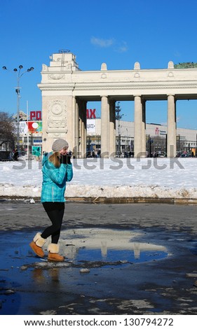 MOSCOW, RUSSIA - MARCH 08: Happy young woman smiling. International women\'s day celebration in Gorky park in Moscow. Taken on March 08, 2012 in Moscow, Russia.