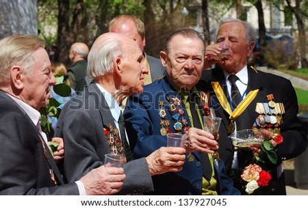 MOSCOW, RUSSIA - MAY 09: War veterans celebrate Victory Day in the Gorky park on May 09, 2013 in Moscow.