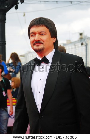 MOSCOW - JUNE 20: Tv presenter, journalist Ildar Zhindarev at XXXV Moscow International Film Festival red carpet opening ceremony. Taken on June 20, 2013 in Moscow, Russia.