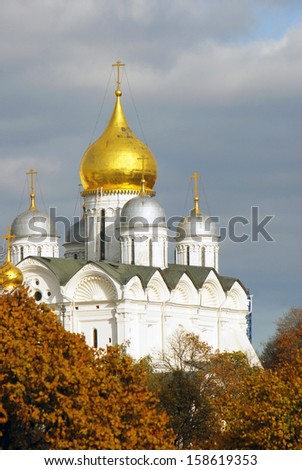 Arkhangel\'s church in Moscow Kremlin in autumn, UNESCO World Heritage Site. Blue sky with clouds background.