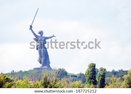 VOLGOGRAD, RUSSIA - SEPTEMBER 16, 2013: View of the Motherland sculpture from the Volga river. Popular touristic landmark, a symbol of Volgograd.