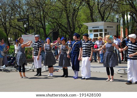 MOSCOW, RUSSIA - MAY 09, 2013: Young actors perform in the Gorky park. Victory Day celebration in Moscow.