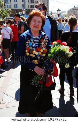 MOSCOW - MAY 09, 2014: A senior war veteran woman portrait. Victory Day celebration in Moscow.
