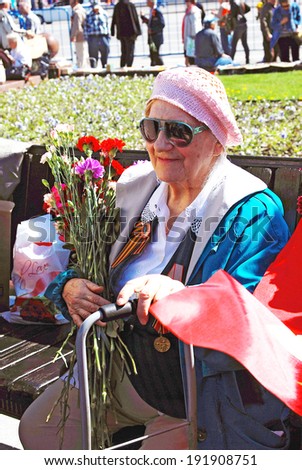 MOSCOW - MAY 09, 2014: Portrait of a war veteran woman. Victory Day celebration in Moscow.
