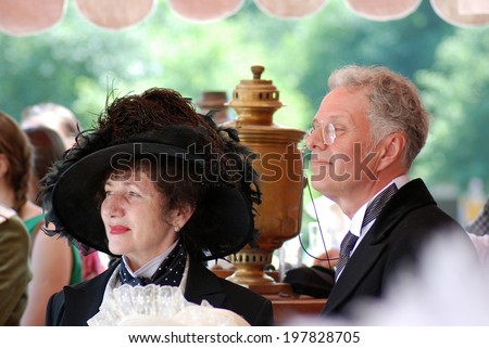 MOSCOW - JUNE 08, 2014: Portrait of man and woman in historical costumes. Times and Ages International Historical Festival in Kolomenskoye park, Moscow.