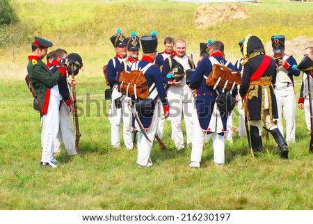 MOSCOW REGION - SEPTEMBER 07, 2014: Reenactors dressed as Napoleonic war French soldiers stand at Borodino battle historical reenactment.