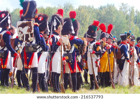 MOSCOW REGION - SEPTEMBER 07, 2014: Reenactors dressed as Napoleonic war French soldiers stand at Borodino battle historical reenactment.