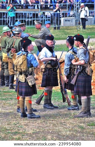 MOSCOW - JUNE 08, 2014: Men in Scottish kilts. First World War battle historical reenactment. Times and Ages International Historical Festival in Kolomenskoye park, Moscow.