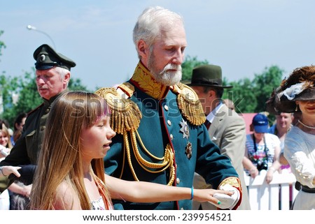 MOSCOW - JUNE 08, 2014: Portrait of people in historical costumes. Times and Ages International Historical Festival in Kolomenskoye park, Moscow.