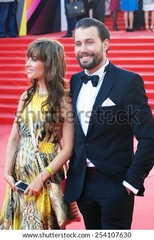 MOSCOW - JUNE 20, 2013: Julia Beretta and Daniil Fedorov at XXXV Moscow International Film Festival red carpet opening ceremony.