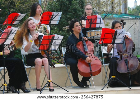 MOSCOW - SEPTEMBER 06, 2014: Orchestra plays in the Gorky park. Moscow City Day celebration in Moscow city center.