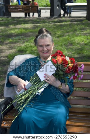 MOSCOW - MAY 09, 2015: War veteran woman portrait. Victory Day celebration in Moscow.