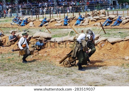 MOSCOW - JUNE 08, 2014: First World War battle historical reenactment. Times and Ages International Historical Festival in Kolomenskoye park, Moscow.