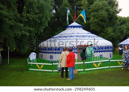 MOSCOW - JULY 18, 2015: Sabantui celebration in Moscow, in Kolomenskoye park. Sabantui is a national Tatar and Bashkir festival, celebration of end of spring field work.