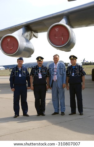 ZHUKOVSKY, MOSCOW REGION, RUSSIA - AUGUST 26, 2015: Pilots stand by airplanes shown at International Aerospace Salon MAKS-2015 in Zhukovsky, Moscow region, Russia.