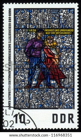 GERMANY - CIRCA 1968 stamp printed in East Germany, shows  Sachsenhausen Memorial Museum , windows of  triptych of Museum of anti-fascist resistance of  European peoples by Walter Womacka ,circa 1968.