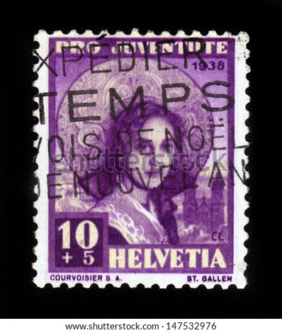 SWITZERLAND - CIRCA 1938: stamp printed by Switzerland, shows young woman in hat, to support work of Pro Juventute, charitable foundation, dedicated to supporting rights of swiss children, circa 1938