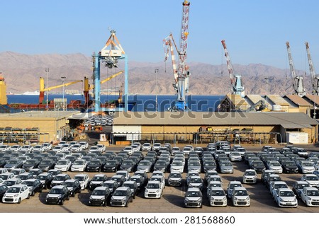 EILAT, ISRAEL - MAY 17, 2015 : cargo port and new cars for sale in Israel  Eilat, Israel on May 17, 2015 Eilat port is located on the coast of the Red Sea
