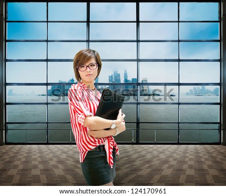 Business woman indoor, closeup portrait of Asian inside building of office