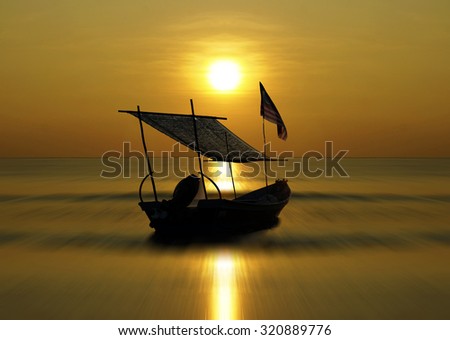 Silhouette of boat when sun rising up