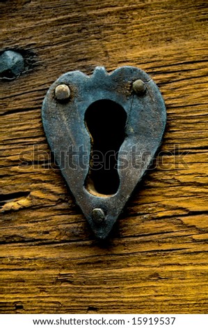 close up of an old heart shaped lock