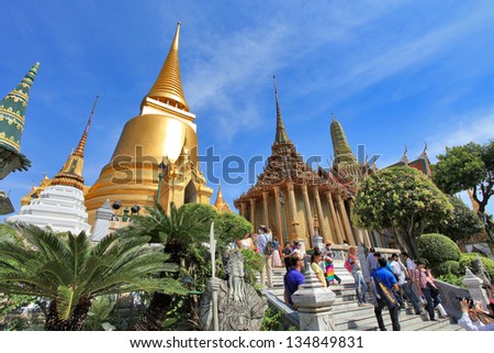 BANGKOK THAILAND - JAN 03 : Many people go to the Grand Palace  (also called Wat Phra Kaew) on January 03, 2013 in Bangkok, Thailand.