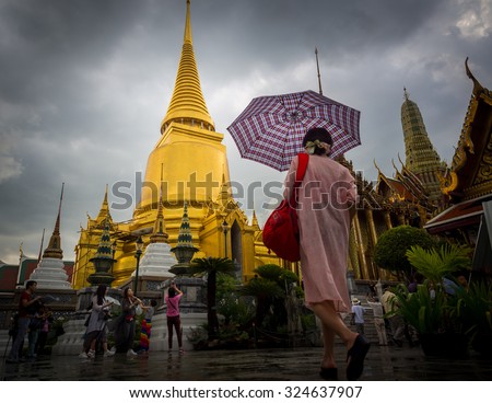 BANGKOK,THAILAND SEP 29: Wat pra kaew, Grand palace under dark raincloud, view in the rainy season. on SEPTEMBER 29, 2015 in Bangkok, Thailand.
