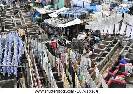 Dhobi Ghat is a well known open air laundromat in Mumbai, India. The washers, locally known as Dhobis, work in the open to wash the clothes from Mumbai\'s hotels and hospitals.