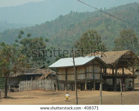 Lonely child in hilltribe village, Shan State, Myanmar (Burma)