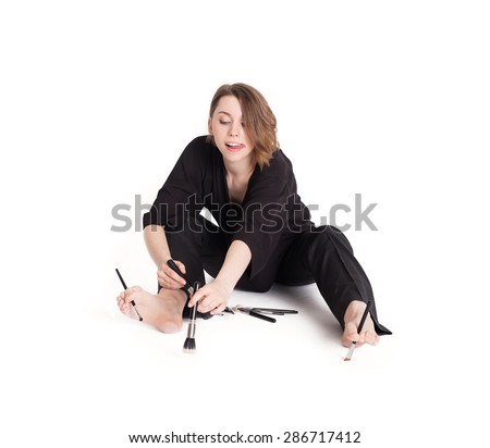 Creative Business Woman Make up Artist  with Makeup Brushes on white background isolated