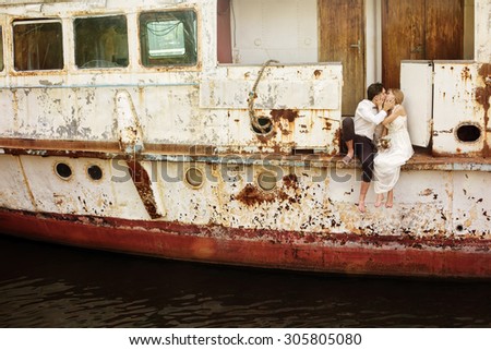 Beautiful Love Wedding Couple Kissing on the Old Ship. Honeymoon