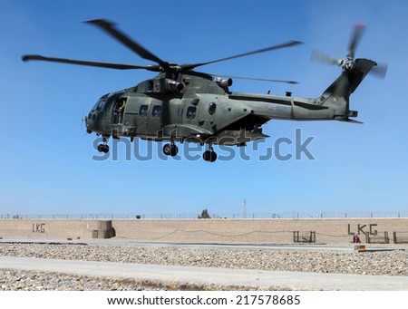LASHKAR GAH, HELMAND PROVINCE - 24 MARCH 2013:  An Augusta Westland Merlin HC3 from 78 Squadron RAF flares for landing at a forward operating base.  The military continue to be involved in operations.