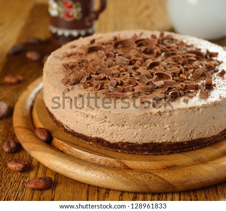 Cold chocolate cheesecake on brown table