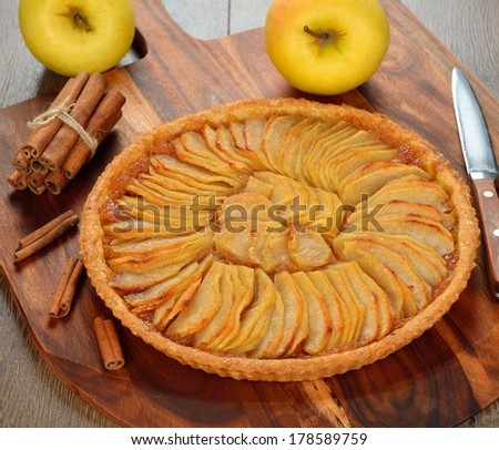 Similar – Image, Stock Photo Traditional french apple tart over brown planks