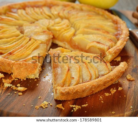 Similar – Image, Stock Photo Traditional french apple tart over brown planks