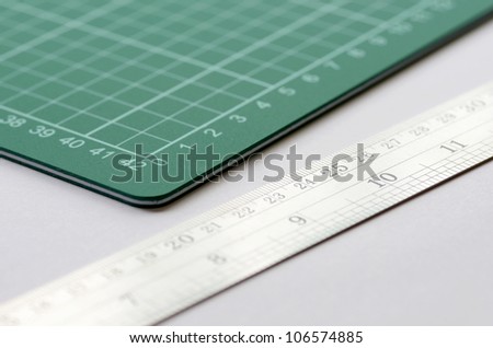 stationary - green cutting mat & steel ruler