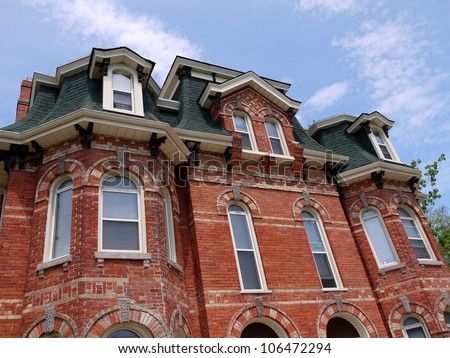 Victorian house with mansard roof