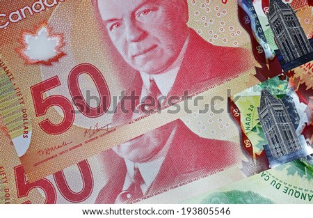 OTTAWA - NOVEMBER 7, 2013:  The Bank of Canada issued new high tech polymer money with holograms that will last longer and be harder to counterfeit.