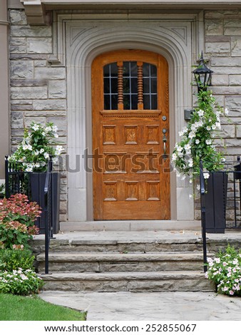 front door with flower pots