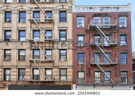 Similar – Foto Bild Fensterln- und Feuerleiterln in Manhattan