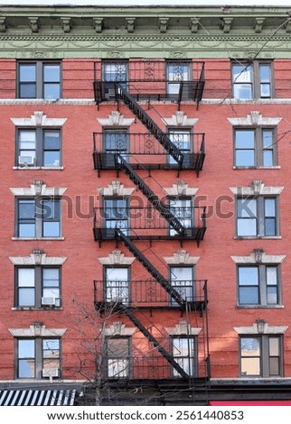 Similar – Foto Bild Fensterln- und Feuerleiterln in Manhattan