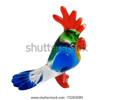 Colorful glass statuette of a parrot isolated