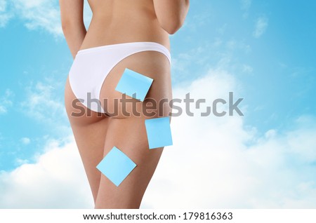 Beautiful body of woman exposing bottom and back side, Isolated on sky background