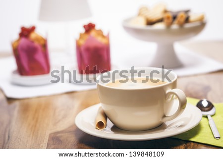 A cup of coffee with nice cake
